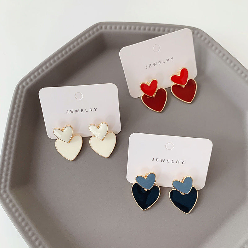 Pendientes colgantes de mujer esmaltados de aleación con forma de corazón lindo