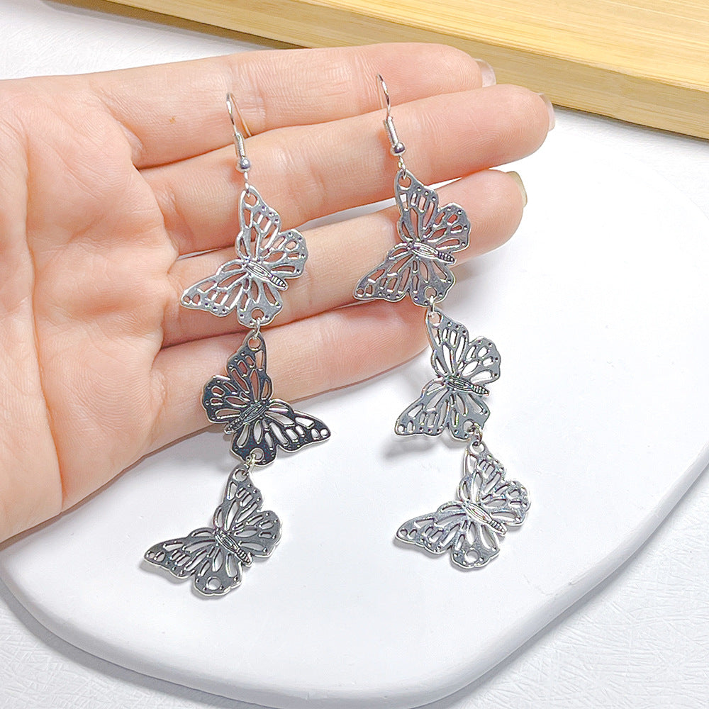 lindos aretes colgantes de metal con forma de mariposa