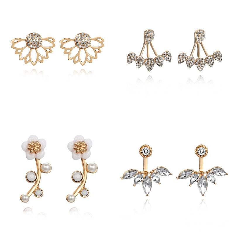 Pendientes colgantes de hojas asimétricas con corazón de cristal
