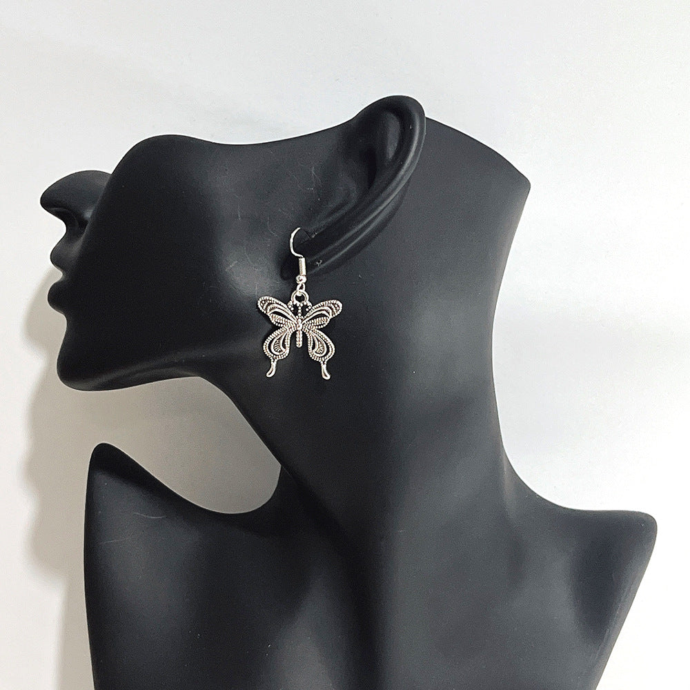 lindos aretes colgantes de metal con forma de mariposa