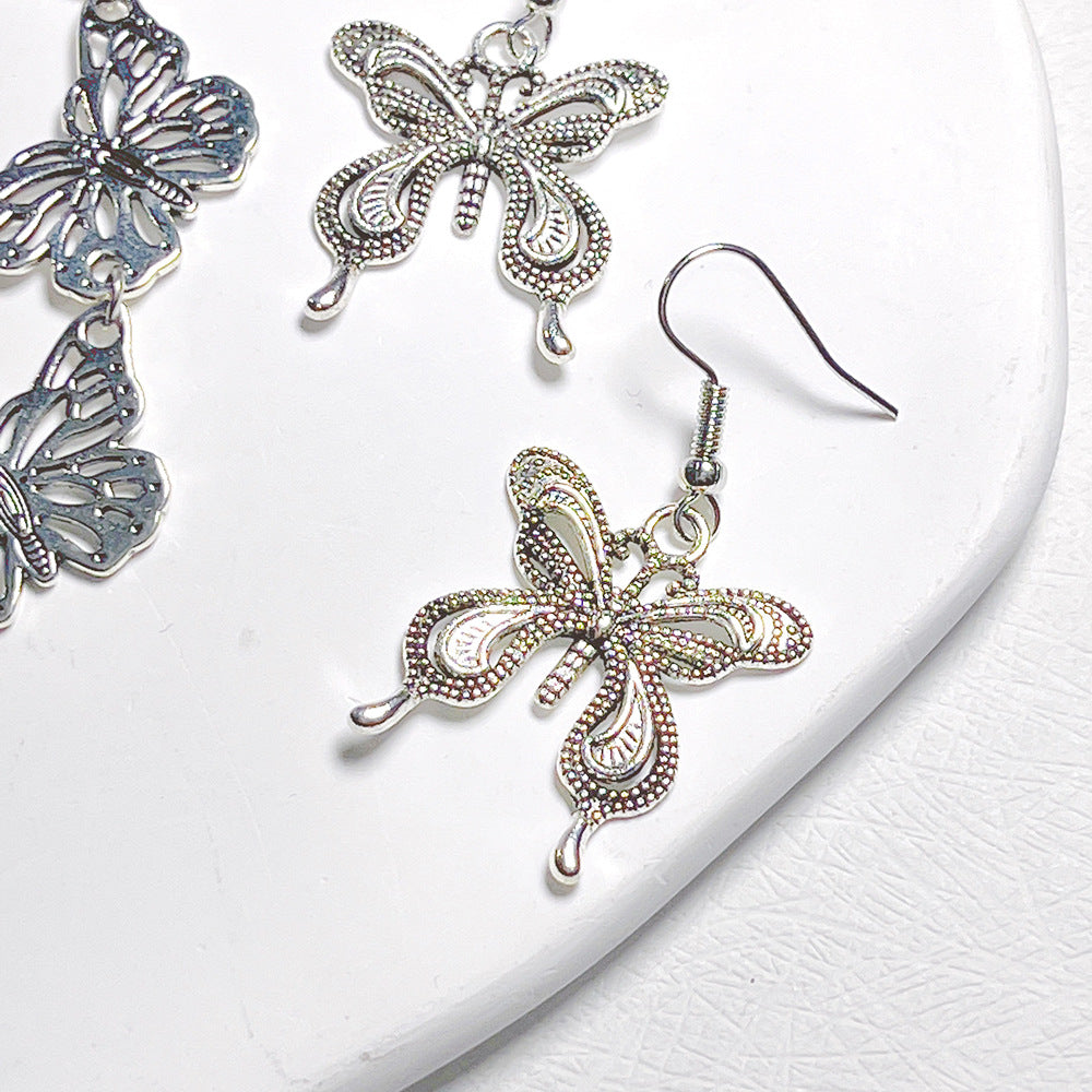 lindos aretes colgantes de metal con forma de mariposa