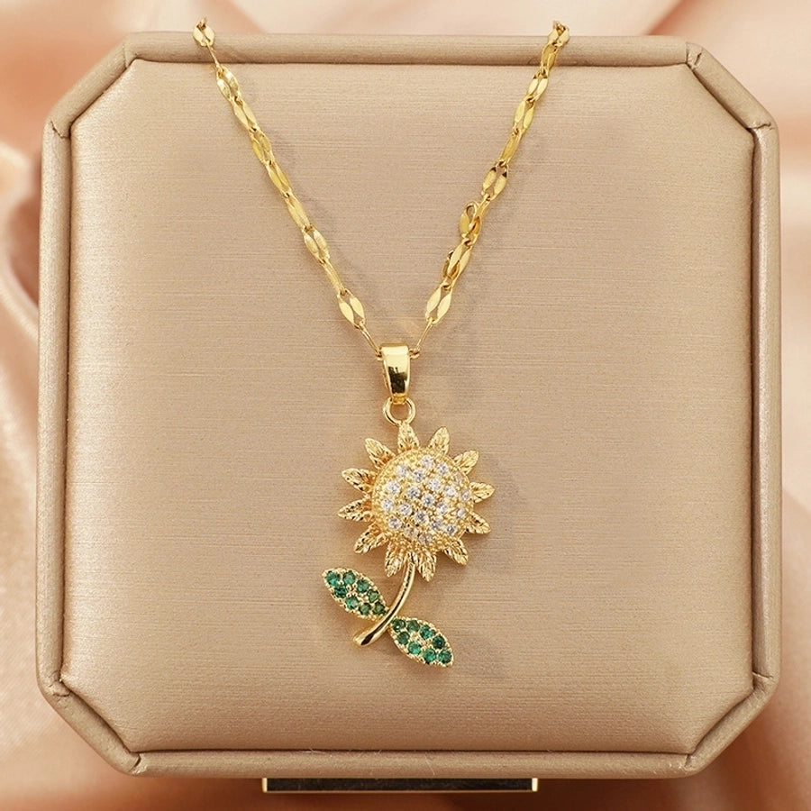 Collar con colgante chapado en oro con incrustaciones de acero de titanio y flor en forma de corazón