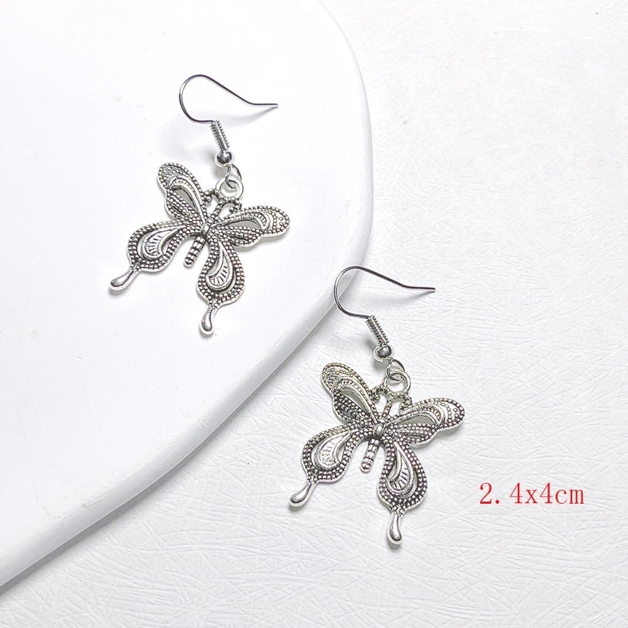 lindos aretes colgantes de metal con forma de mariposa