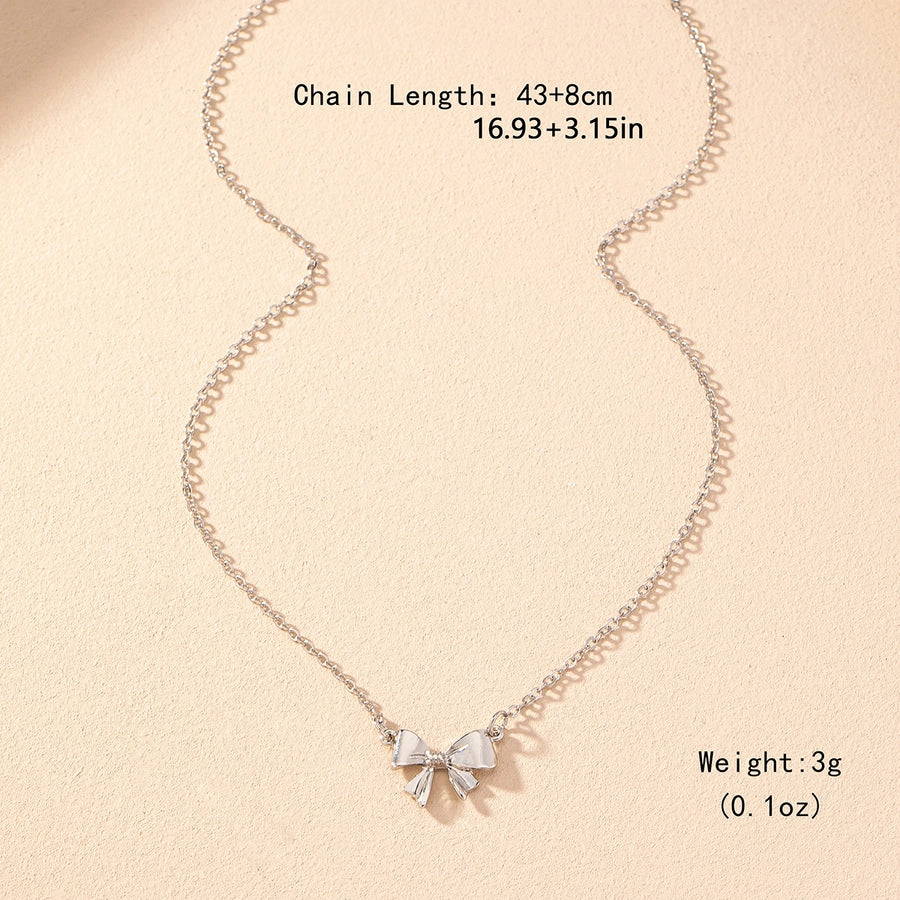 Collares con colgantes Joyas Estilo simple Estilo clásico Lazo Nudo Hierro Aleación de zinc