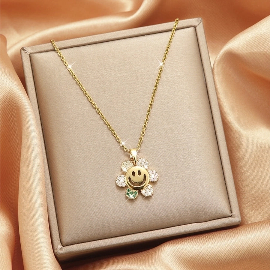Collar con colgante chapado en oro con incrustaciones de acero de titanio y flor en forma de corazón