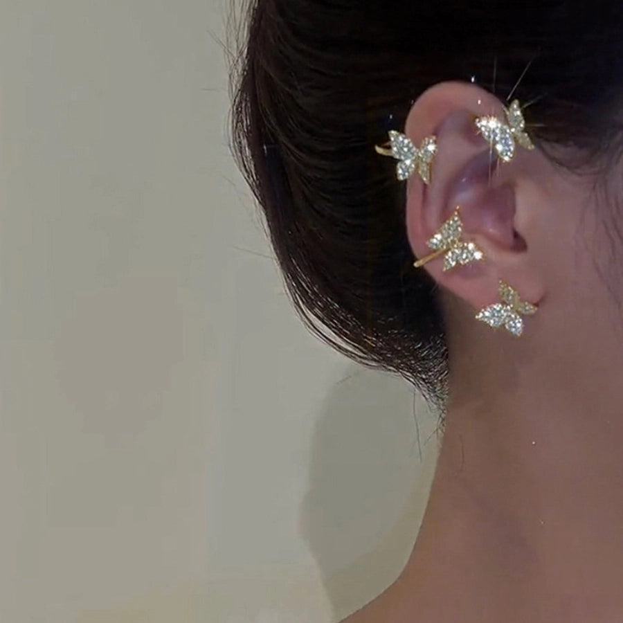 Clips para las orejas con incrustaciones de diamantes artificiales de aleación de mariposa estilo Hada de joyería