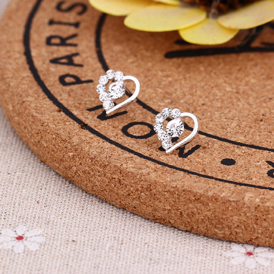 Pendientes de aleación con revestimiento de perlas geométricas de moda