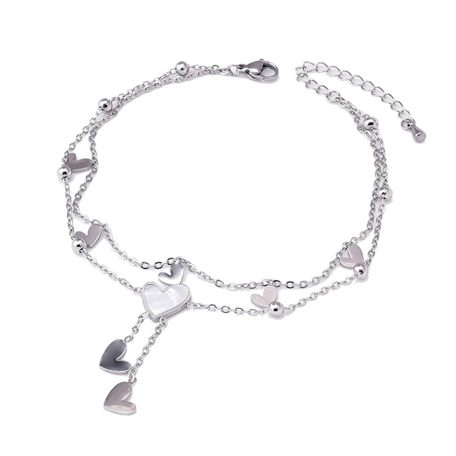 Tobillera de mujer con incrustaciones de acero y titanio con forma de corazón dulce