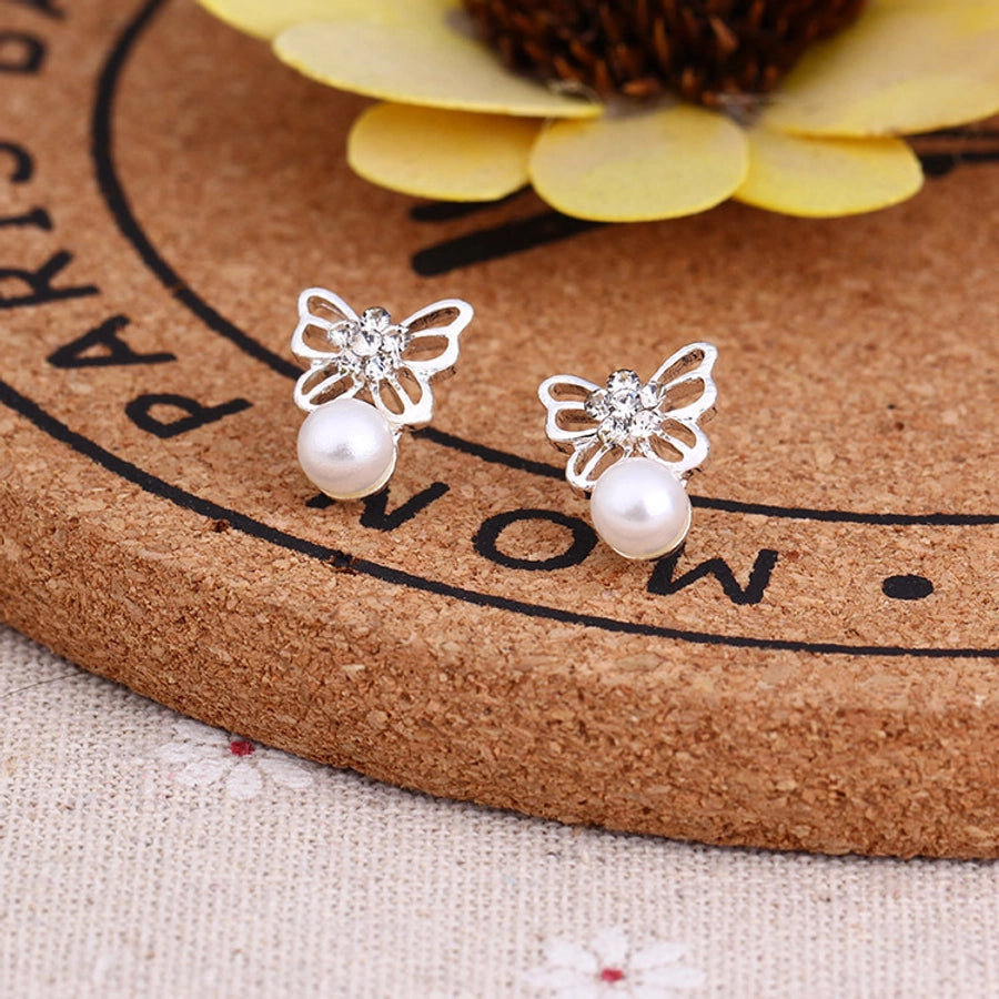 Pendientes de aleación con revestimiento de perlas geométricas de moda