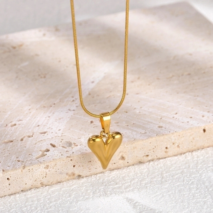 Pendientes de aro chapados en oro de 18K con forma de corazón de pentagrama de estilo clásico lindo e informal ahuecados Acero inoxidable 304 Acero de titanio