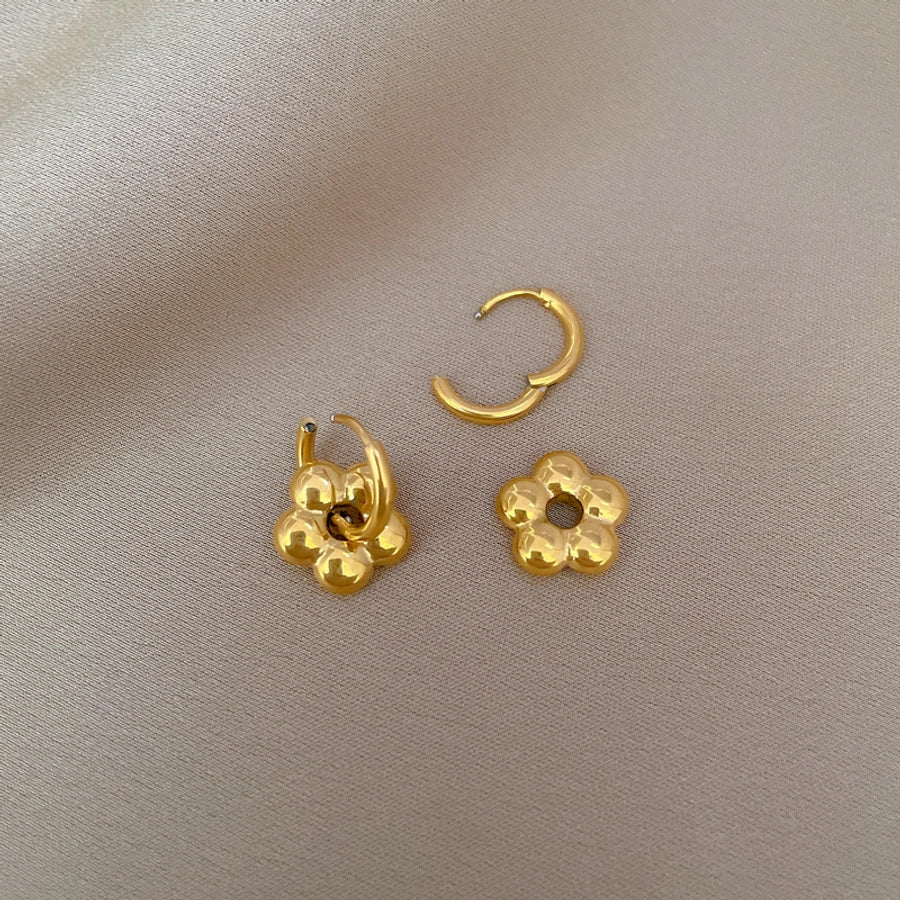 Pendientes de acero de titanio con flores de estilo clásico y estilo simple