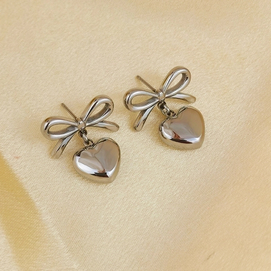 Pendientes de aro chapados en oro de 18K con forma de corazón de pentagrama de estilo clásico lindo e informal ahuecados Acero inoxidable 304 Acero de titanio