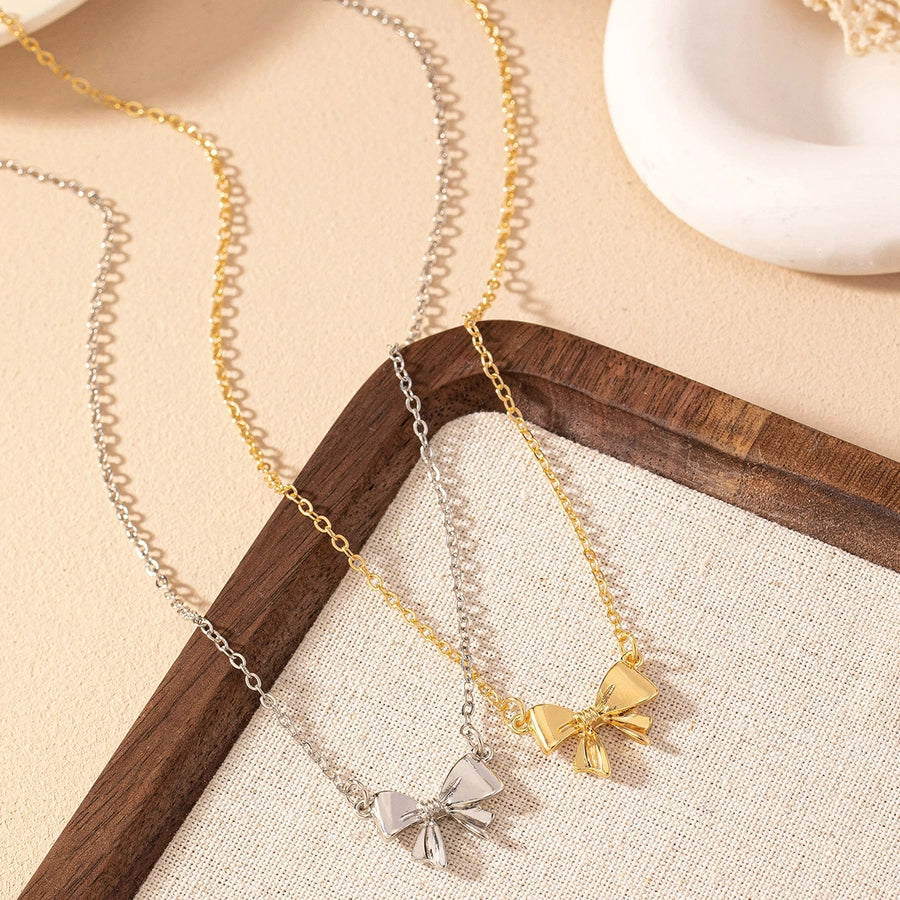 Collares con colgantes Joyas Estilo simple Estilo clásico Lazo Nudo Hierro Aleación de zinc