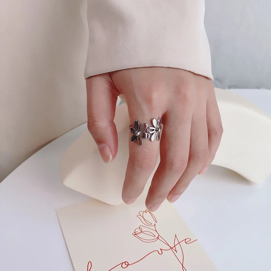 Anillos de acero de titanio con flor pulida linda chapada en oro de 18K