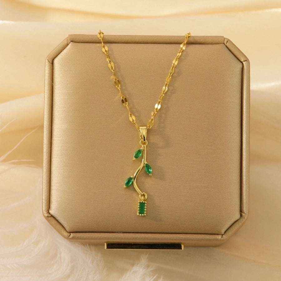 Collar con colgante chapado en oro con incrustaciones de acero de titanio y flor en forma de corazón