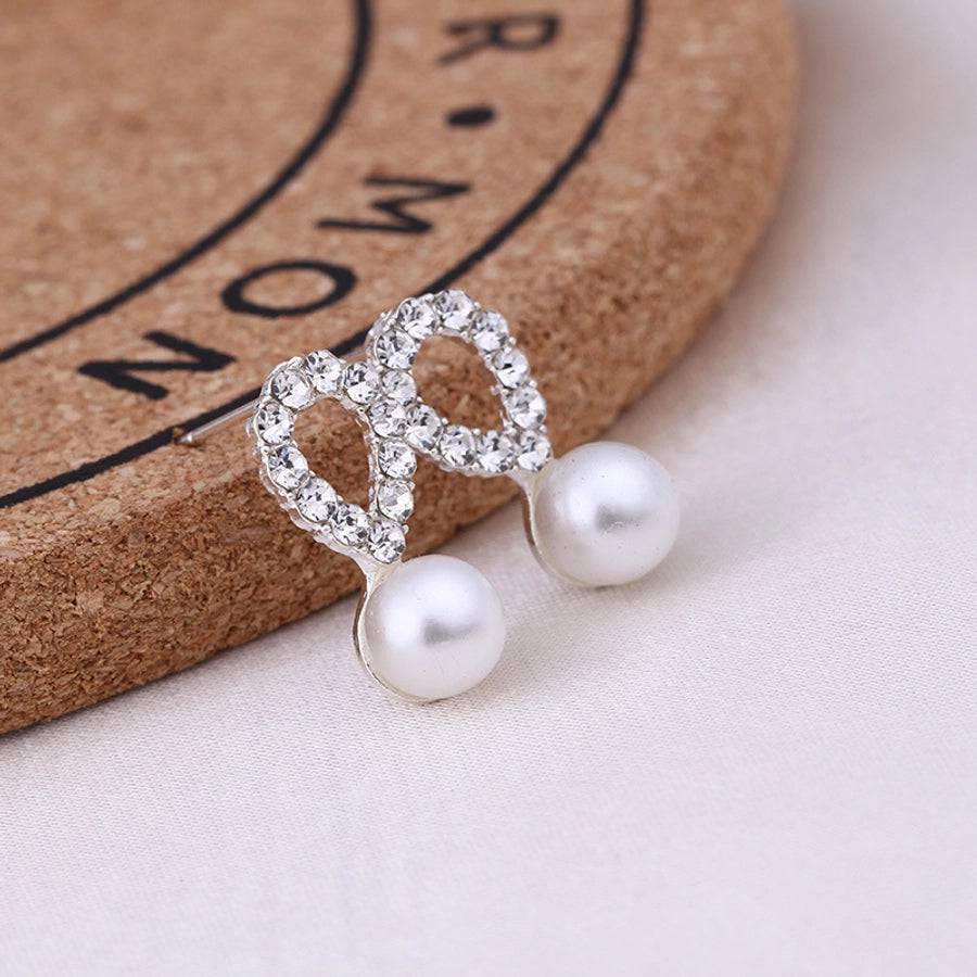 Pendientes de aleación con revestimiento de perlas geométricas de moda
