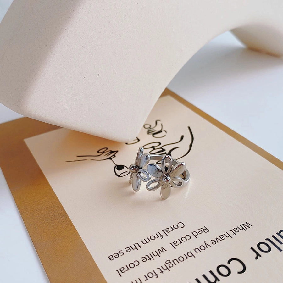Anillos de acero de titanio con flor pulida linda chapada en oro de 18K
