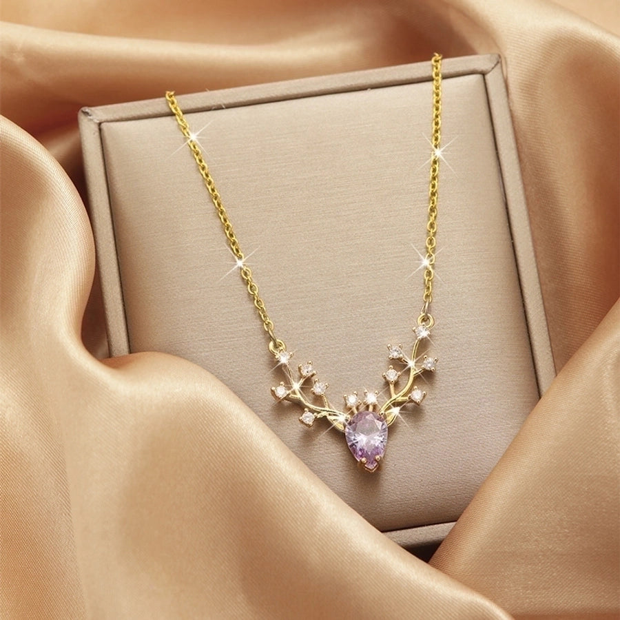 Collar con colgante chapado en oro con incrustaciones de acero de titanio y flor en forma de corazón
