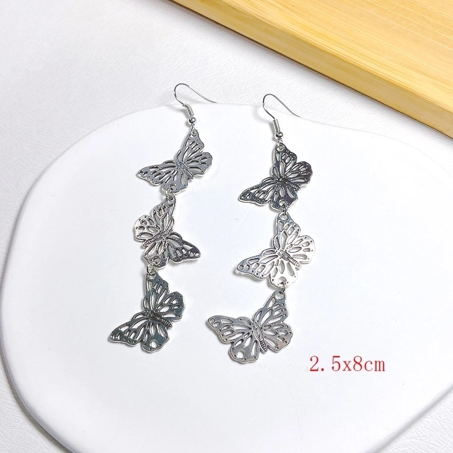 lindos aretes colgantes de metal con forma de mariposa