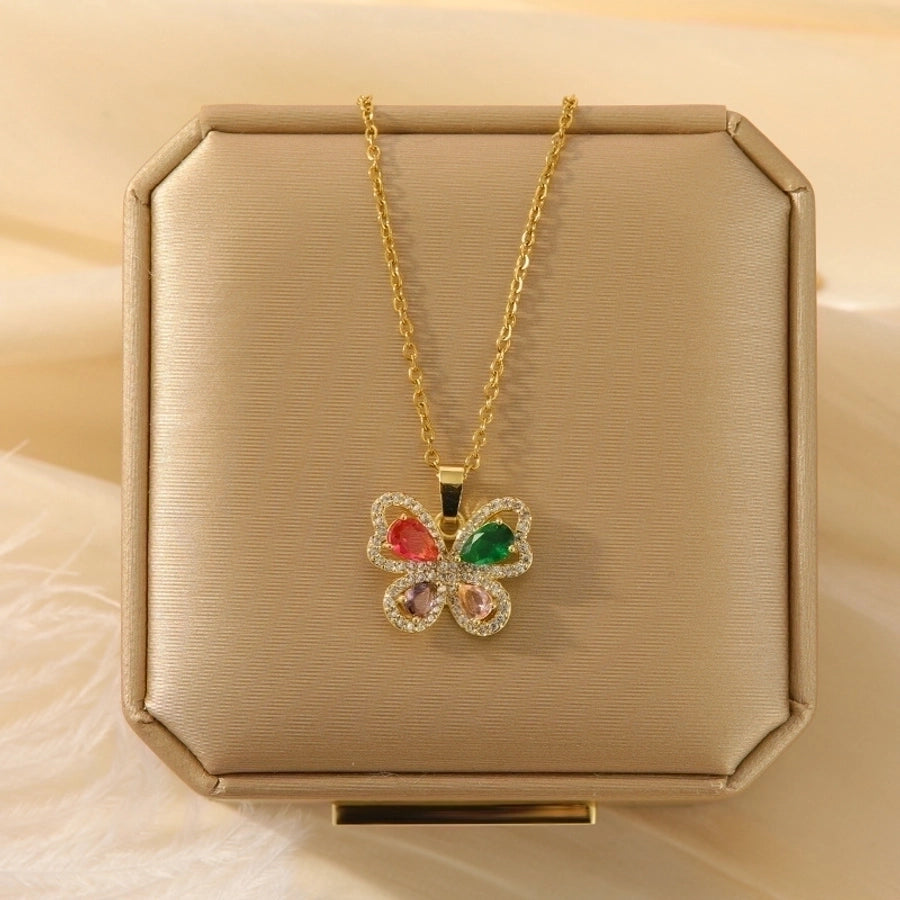 Collar con colgante chapado en oro con incrustaciones de acero de titanio y flor en forma de corazón