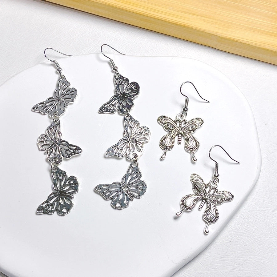 lindos aretes colgantes de metal con forma de mariposa