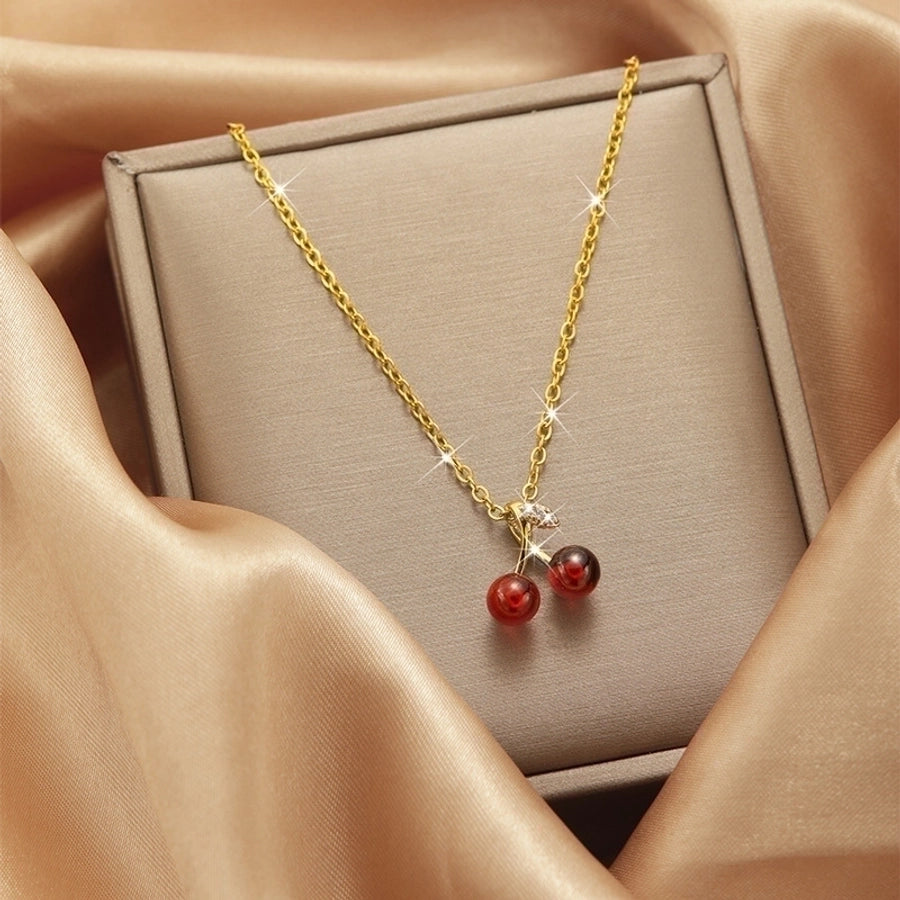 Collar con colgante chapado en oro con incrustaciones de acero de titanio y flor en forma de corazón
