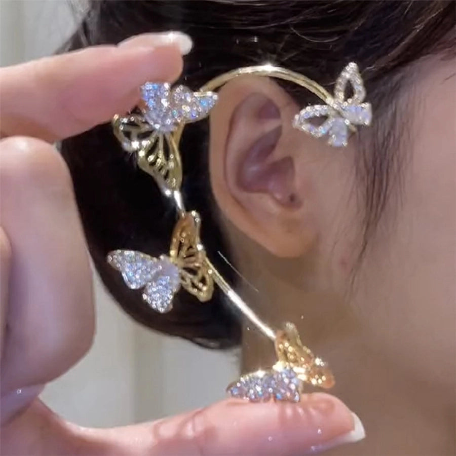 Clips para las orejas con incrustaciones de diamantes artificiales de aleación de mariposa estilo Hada de joyería