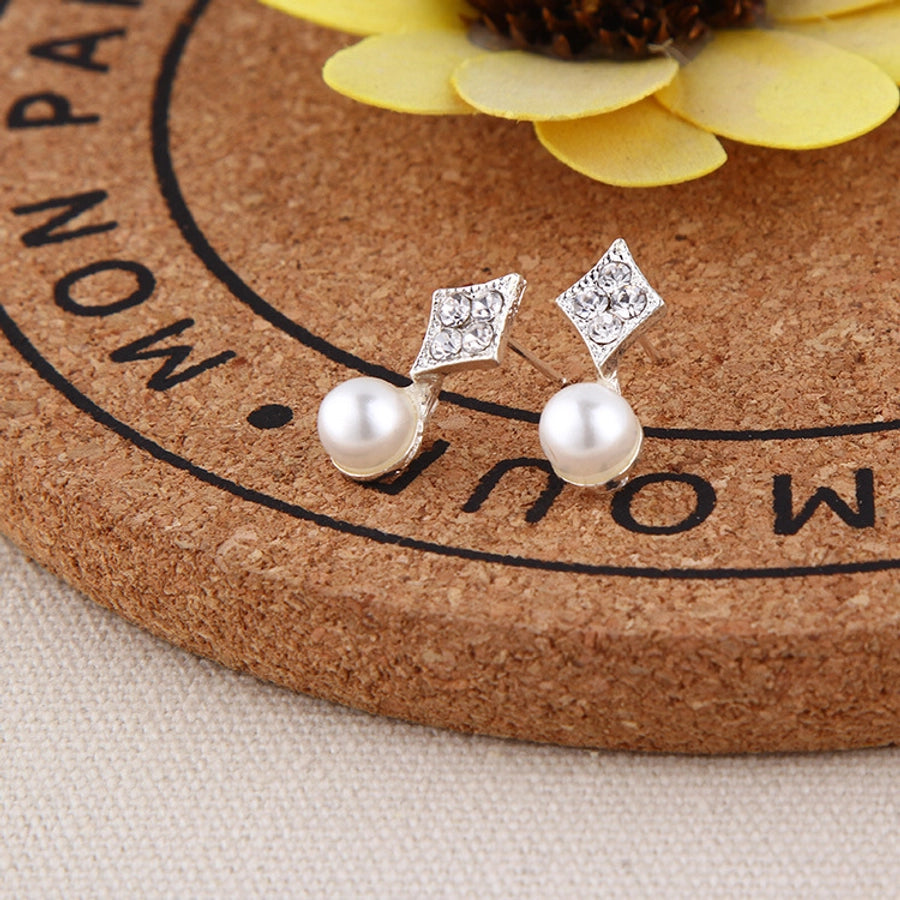 Pendientes de aleación con revestimiento de perlas geométricas de moda