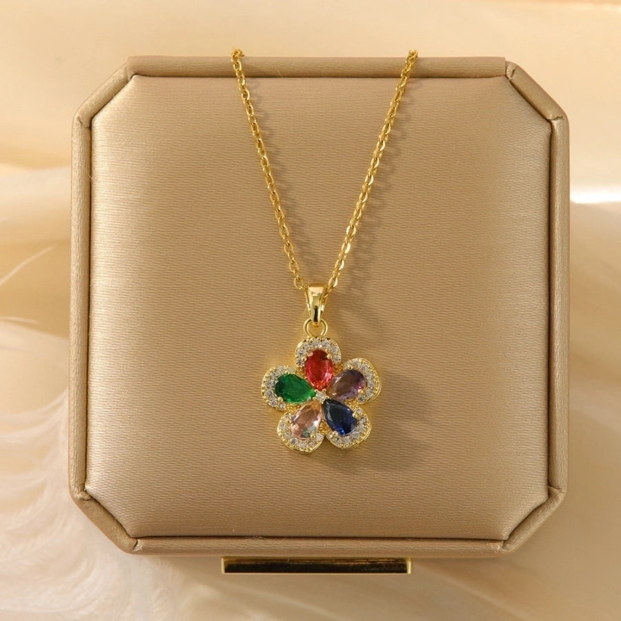 Collar con colgante chapado en oro con incrustaciones de acero de titanio y flor en forma de corazón