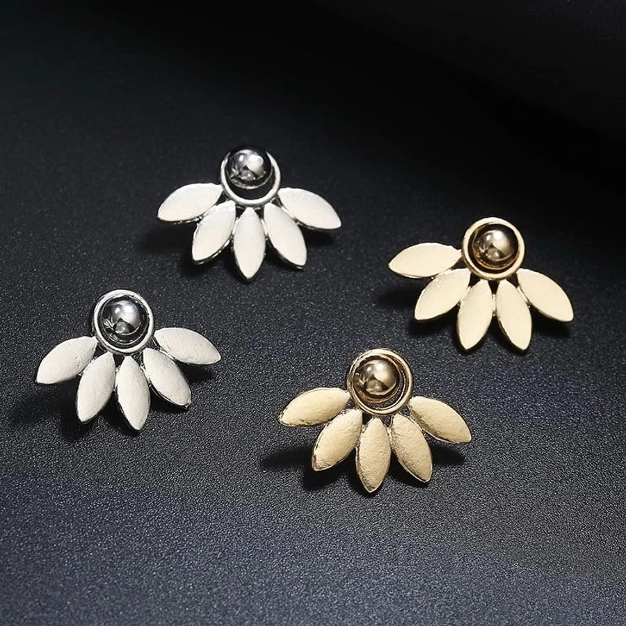 Pendientes colgantes de hojas asimétricas con corazón de cristal