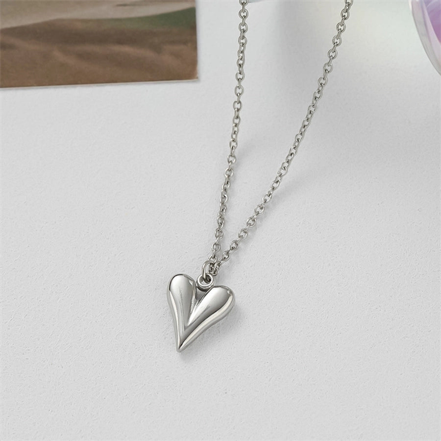 Pendientes de aro chapados en oro de 18K con forma de corazón de pentagrama de estilo clásico lindo e informal ahuecados Acero inoxidable 304 Acero de titanio