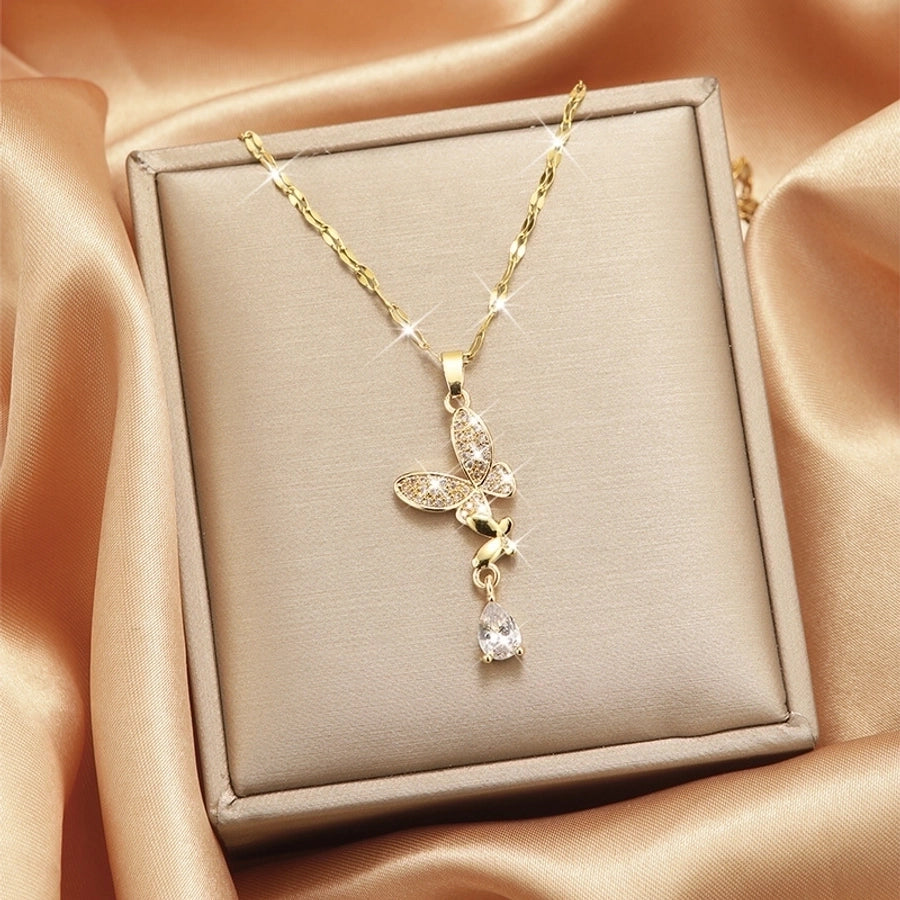 Collar con colgante chapado en oro con incrustaciones de acero de titanio y flor en forma de corazón