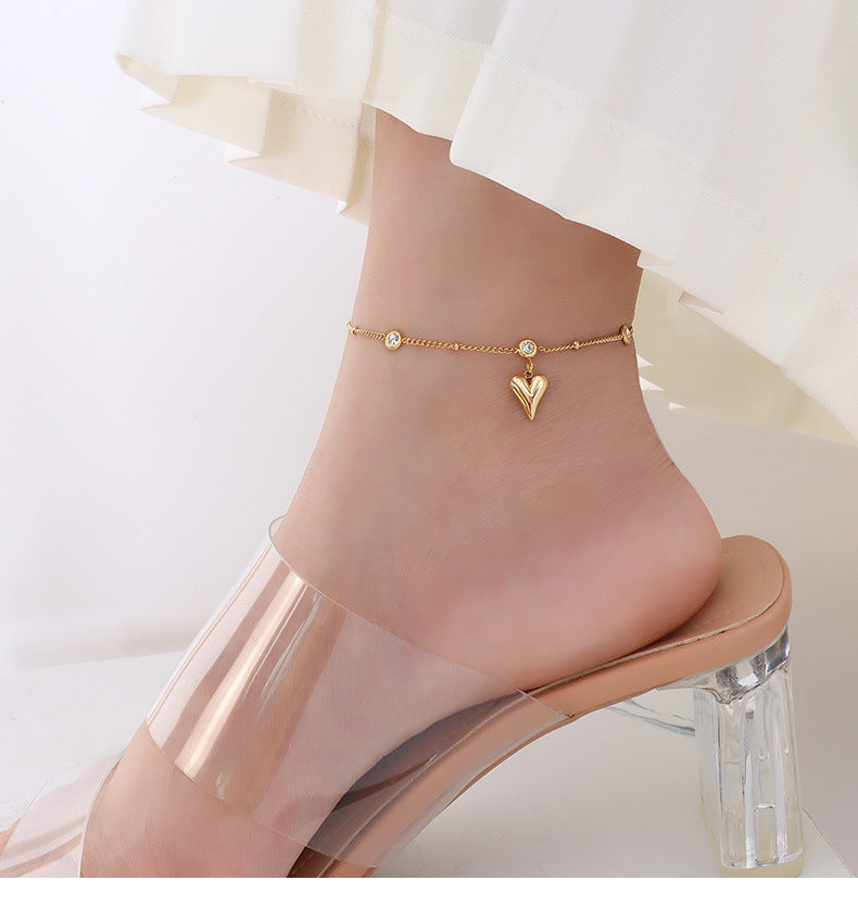 Tobillera con circonita en oro de 18k chapada en acero y titanio con forma de corazón de melocotón