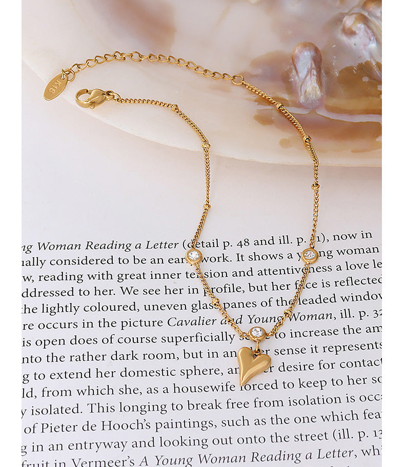 Tobillera con circonita en oro de 18k chapada en acero y titanio con forma de corazón de melocotón