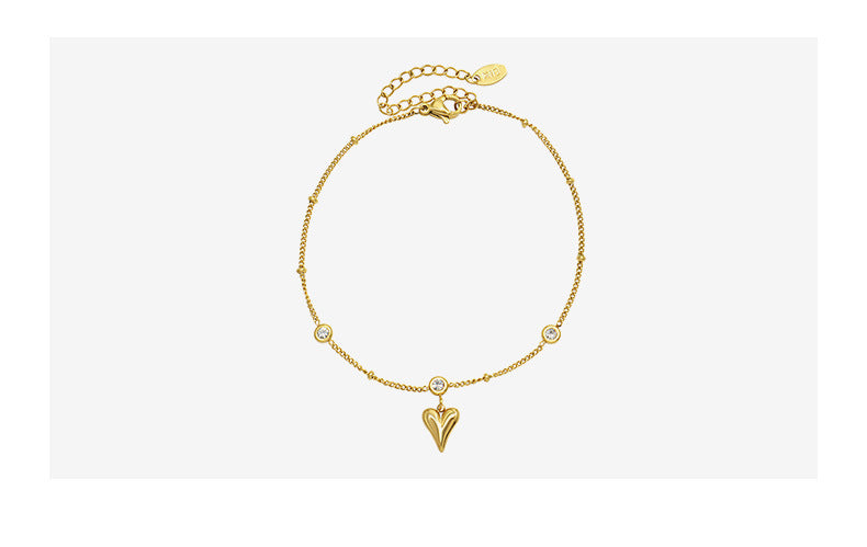 Tobillera con circonita en oro de 18k chapada en acero y titanio con forma de corazón de melocotón