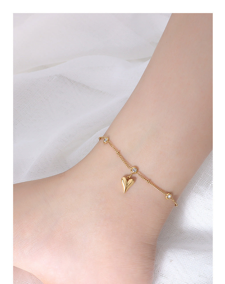 Tobillera con circonita en oro de 18k chapada en acero y titanio con forma de corazón de melocotón