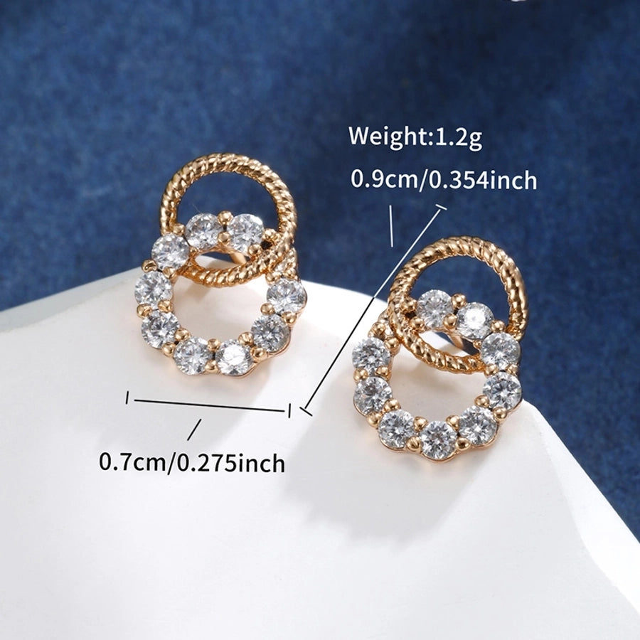 Pendientes de diamantes de imitación de aleación de cobre con incrustaciones de chapado en forma de corazón redondo cruzado elegante estilo de hadas