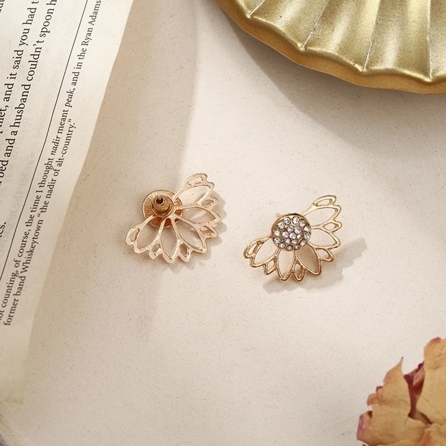 Pendientes colgantes de hojas asimétricas con corazón de cristal