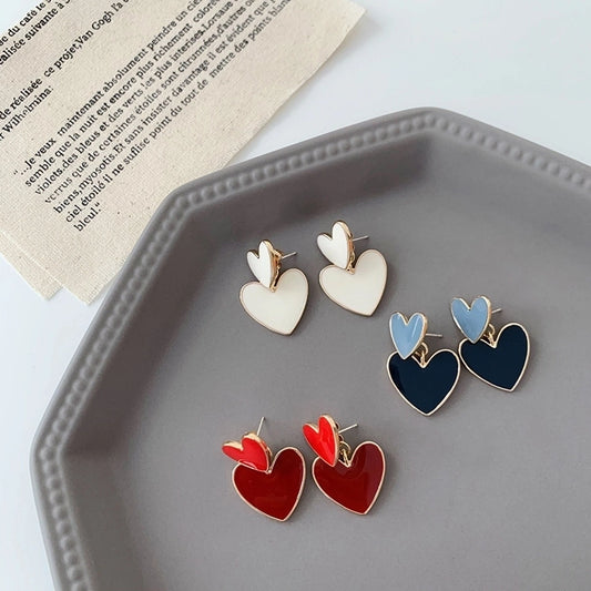 Pendientes colgantes de mujer esmaltados de aleación con forma de corazón lindo