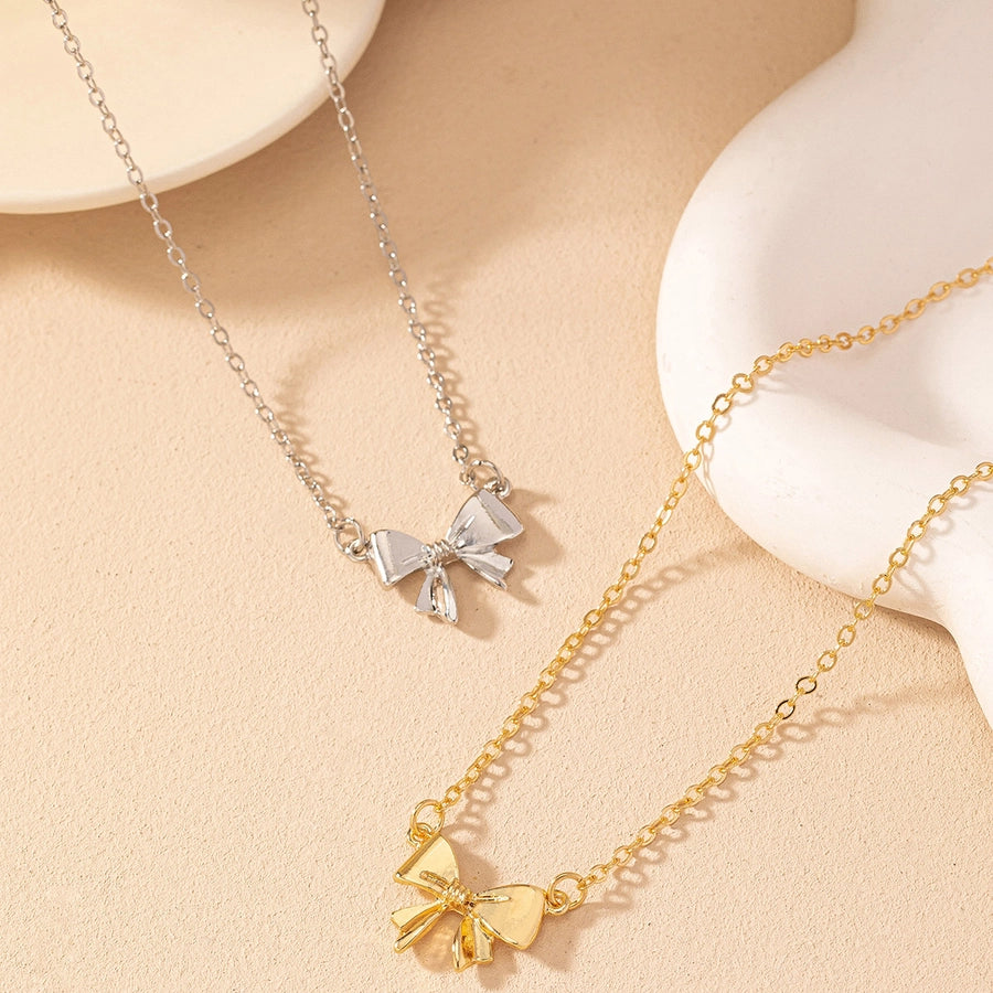 Collares con colgantes Joyas Estilo simple Estilo clásico Lazo Nudo Hierro Aleación de zinc