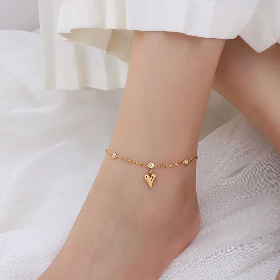 Tobillera con circonita en oro de 18k chapada en acero y titanio con forma de corazón de melocotón