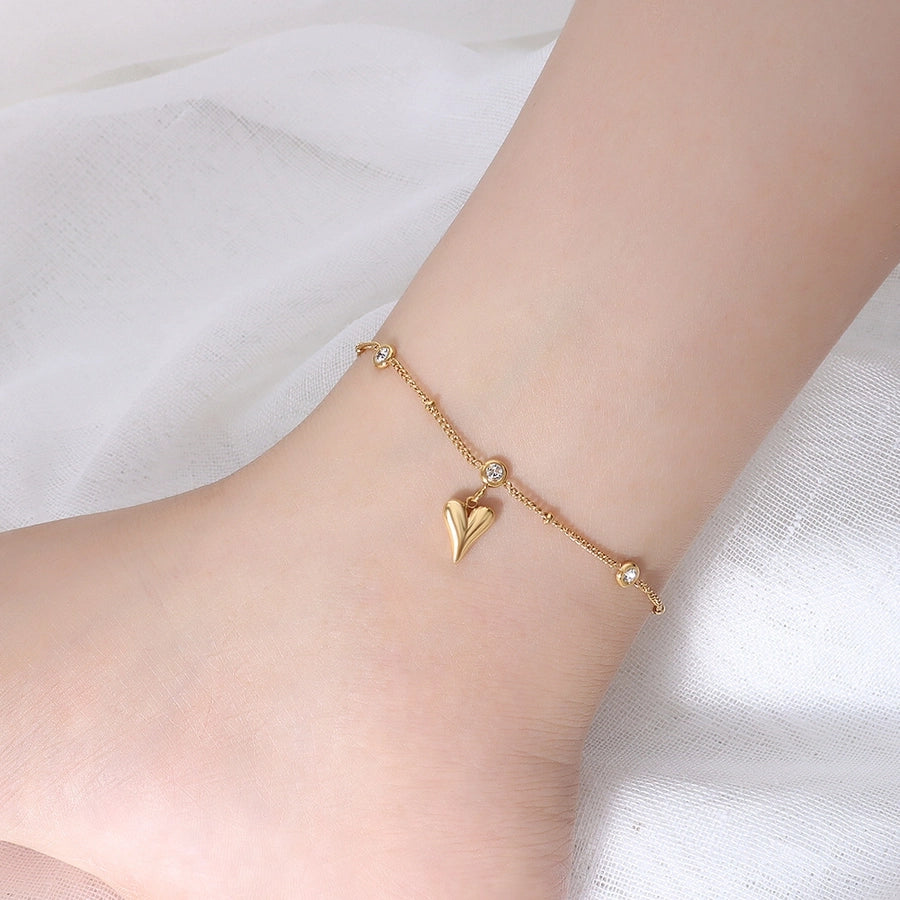 Tobillera con circonita en oro de 18k chapada en acero y titanio con forma de corazón de melocotón