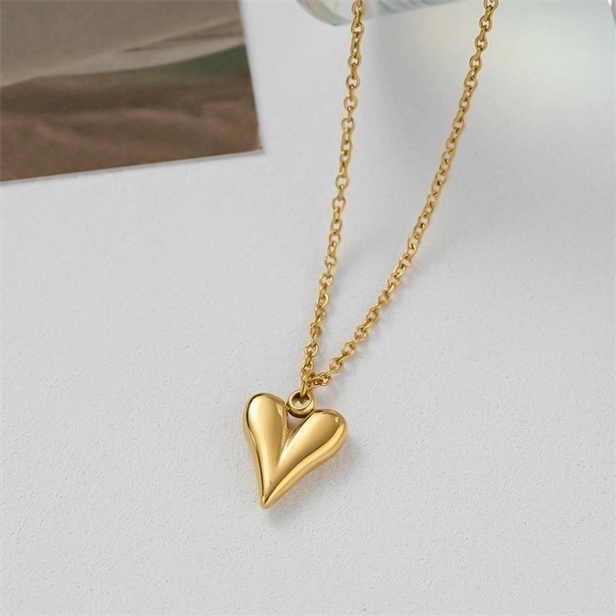 Pendientes de aro chapados en oro de 18K con forma de corazón de pentagrama de estilo clásico lindo e informal ahuecados Acero inoxidable 304 Acero de titanio