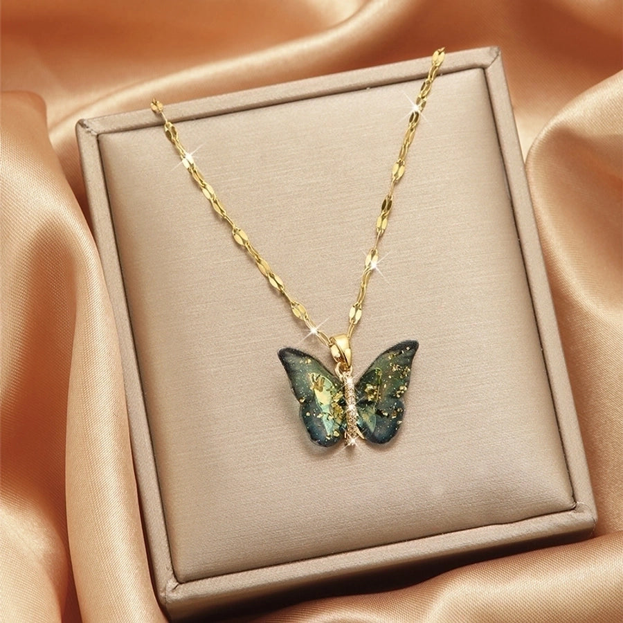 Collar con colgante chapado en oro con incrustaciones de acero de titanio y flor en forma de corazón