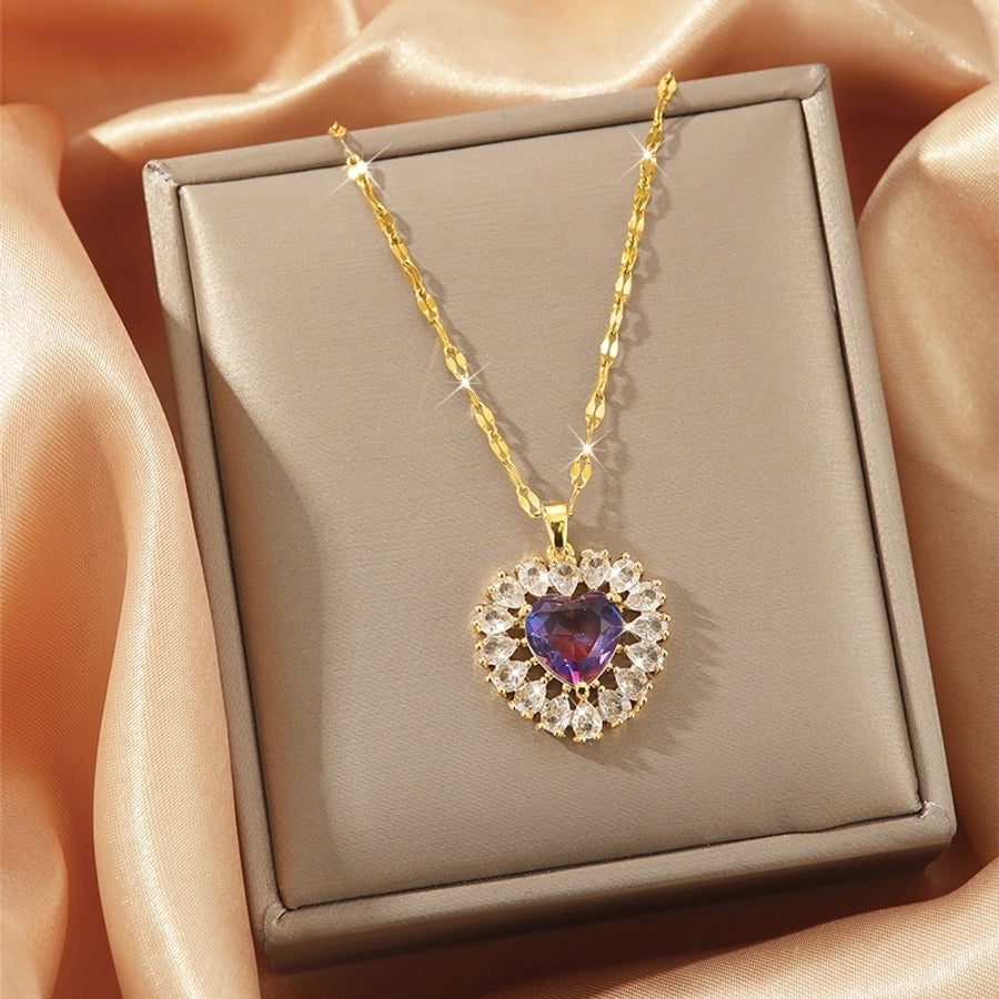Collar con colgante chapado en oro con incrustaciones de acero de titanio y flor en forma de corazón