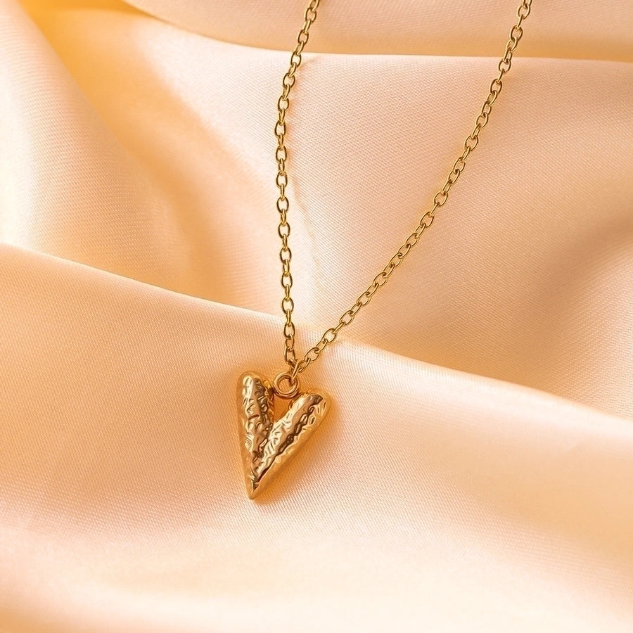 Pendientes de aro chapados en oro de 18K con forma de corazón de pentagrama de estilo clásico lindo e informal ahuecados Acero inoxidable 304 Acero de titanio